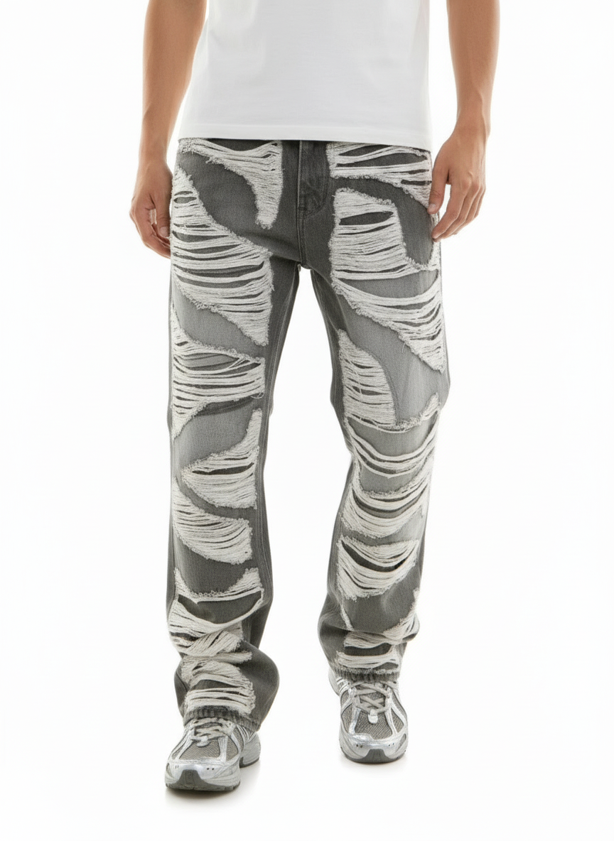 Person wearing gray camouflage pants on a white background