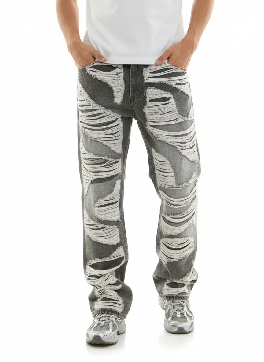 Person wearing gray camouflage pants on a white background