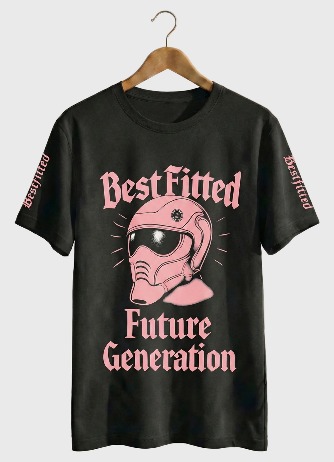 Black t-shirt with pink graphic and text on a hanger against a white background