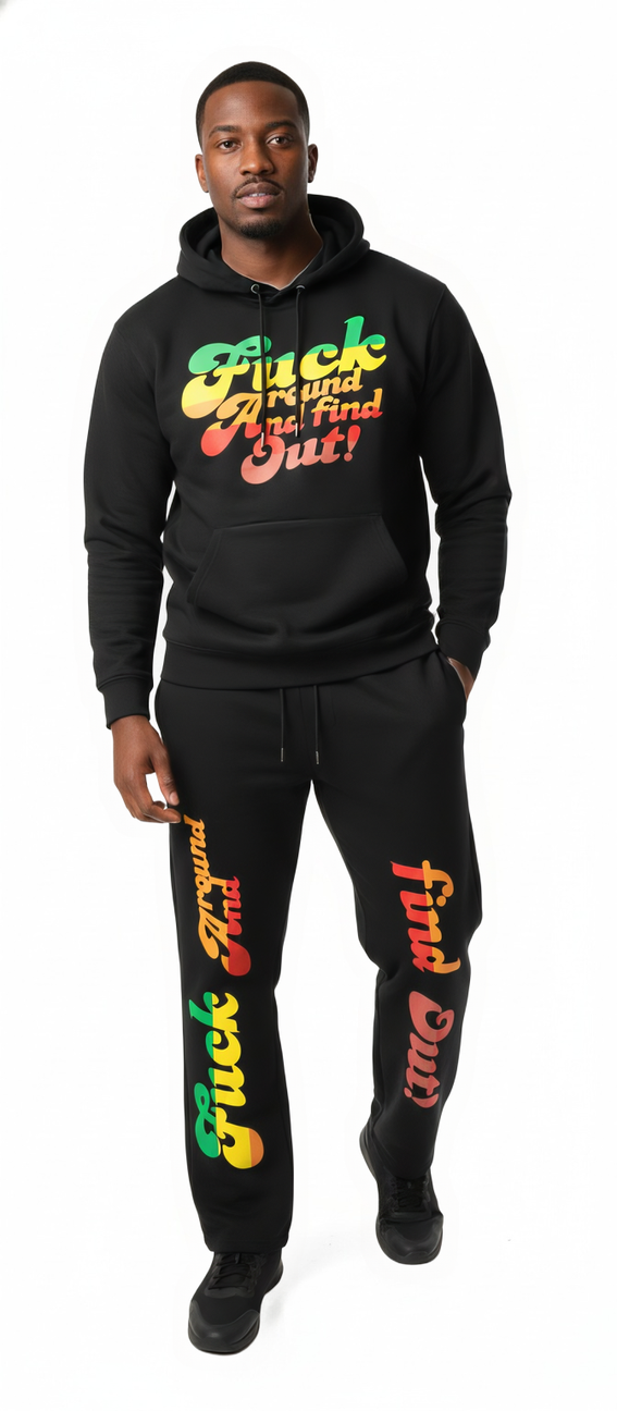Person wearing a black hoodie and pants with colorful text on a white background