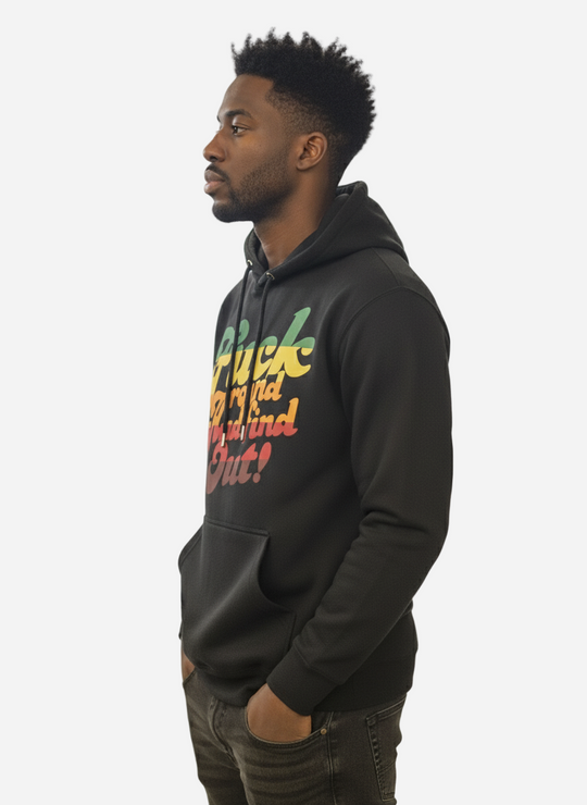 Man wearing a black hoodie with colorful text on a white background