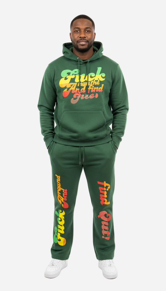 Man wearing a green hoodie and pants with colorful text on a white background