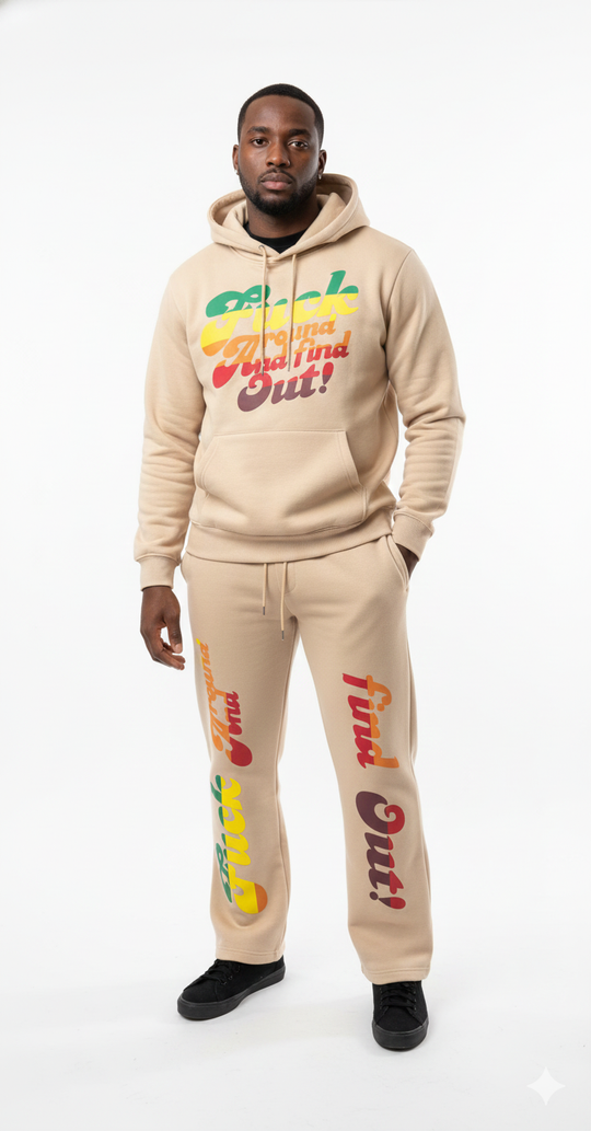 Man wearing a beige hoodie and pants with colorful text on a white background