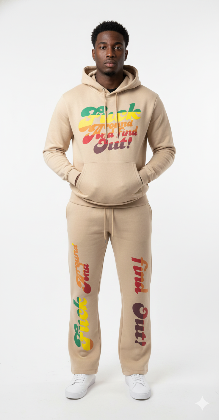 Person wearing a beige tracksuit with colorful text on a white background