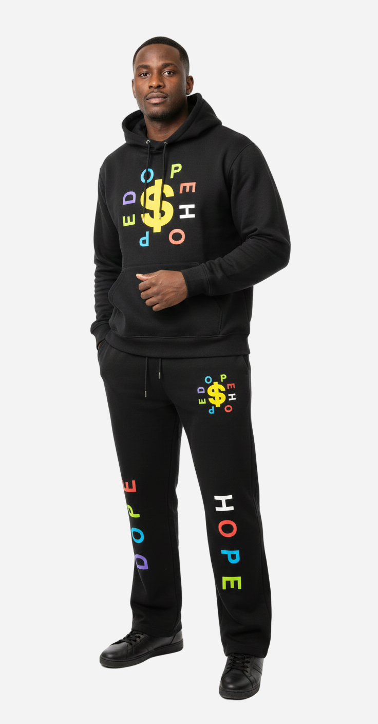 Person wearing a black hoodie and pants with colorful text design on a white background
