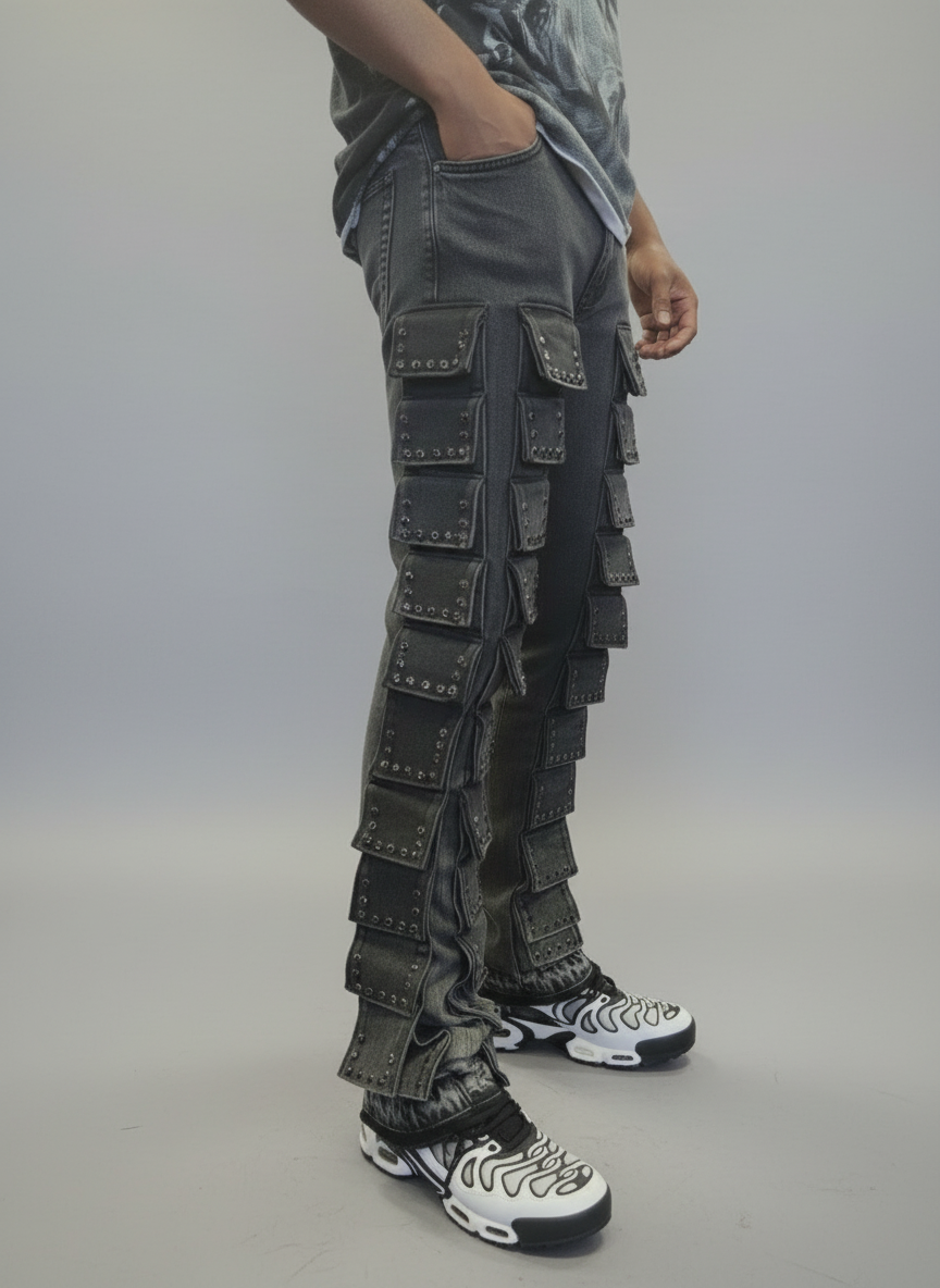 Person wearing dark cargo pants with multiple pockets in a store setting.