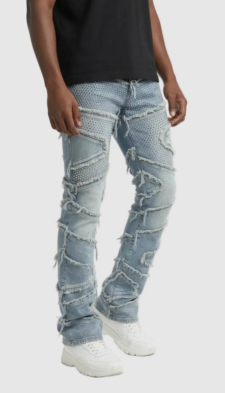 Person wearing light blue distressed jeans on a white background