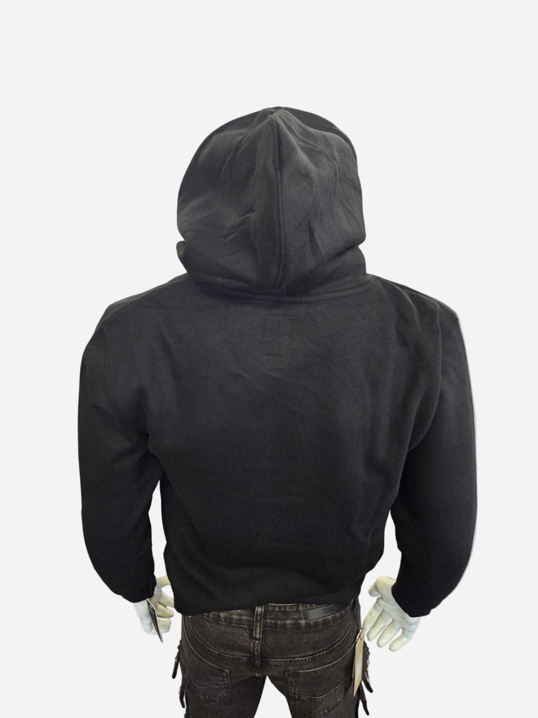 Black hoodie worn by a person on a white background