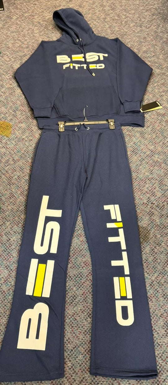 Navy tracksuit with 'BEST FITTED' text on a textured surface