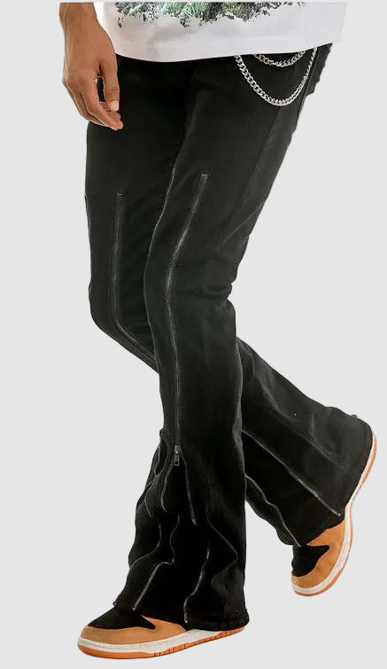 Black pants worn by a person on a white background