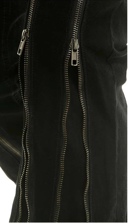 Close-up of a black jacket with silver zippers on a white background
