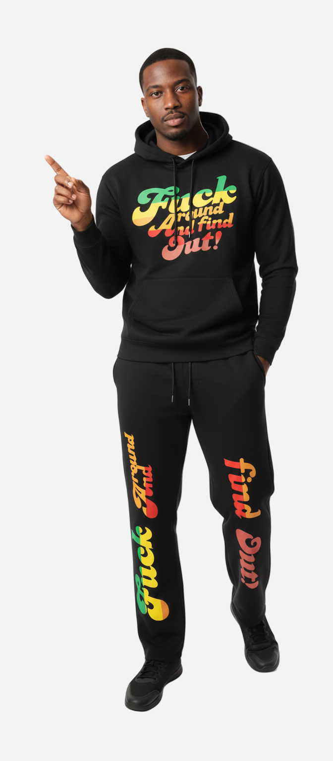 Person wearing a black hoodie and pants with colorful text on a white background
