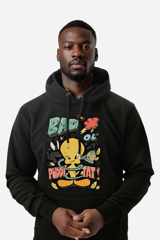 Person wearing a black hoodie with colorful graphic design on a white background